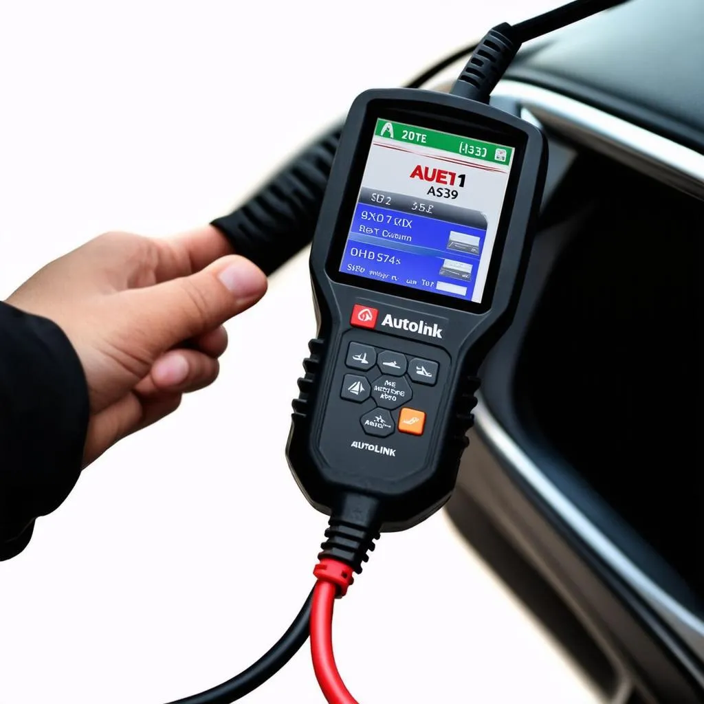 Autel AL319 plugged into car's OBD2 port