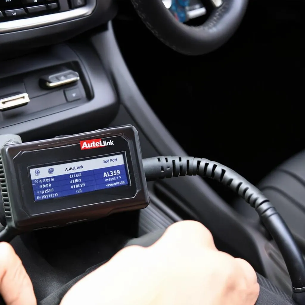 Autel Autolink AL329 connected to a car's OBD2 port