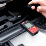 Autel HT309 connected to car's OBD2 port