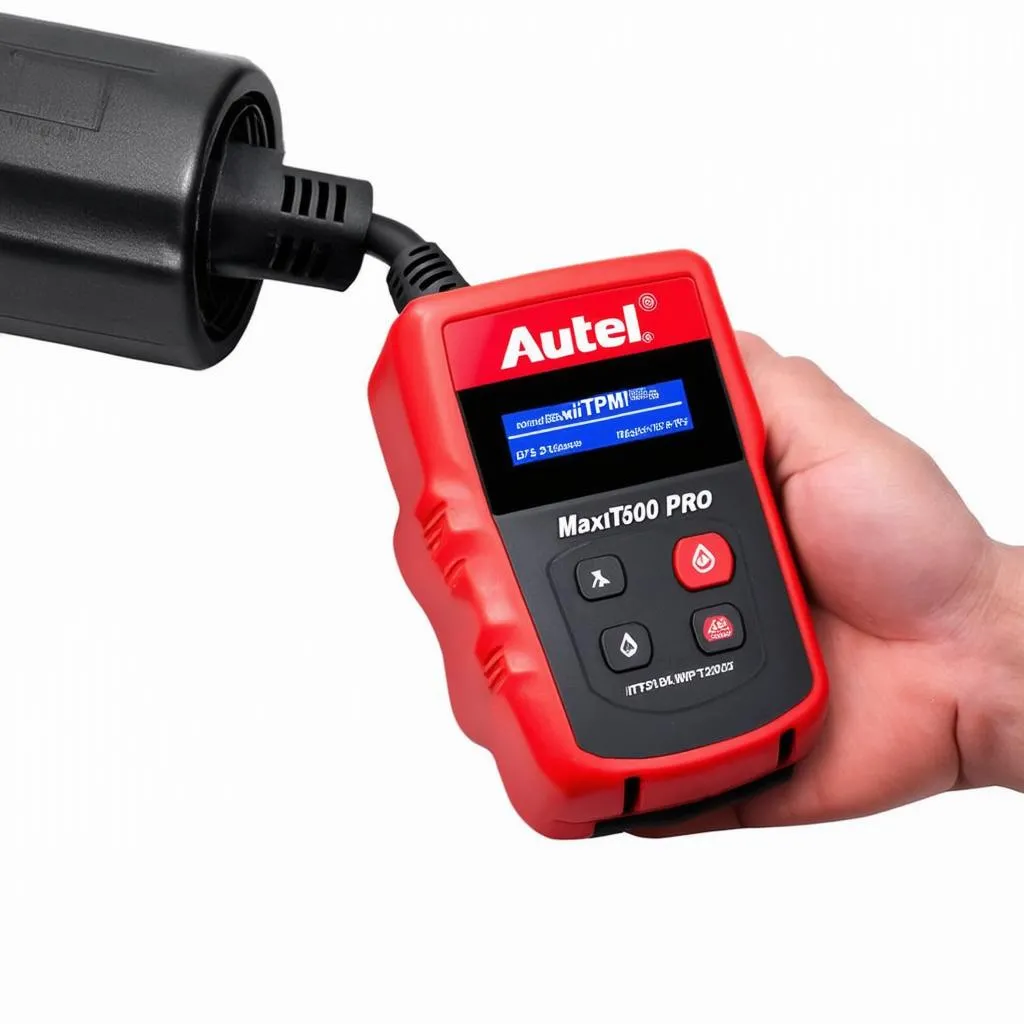 Autel ITS600 Pro connected to a car's OBD-II port