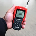 Autel MaxiLink MS409 held in hand