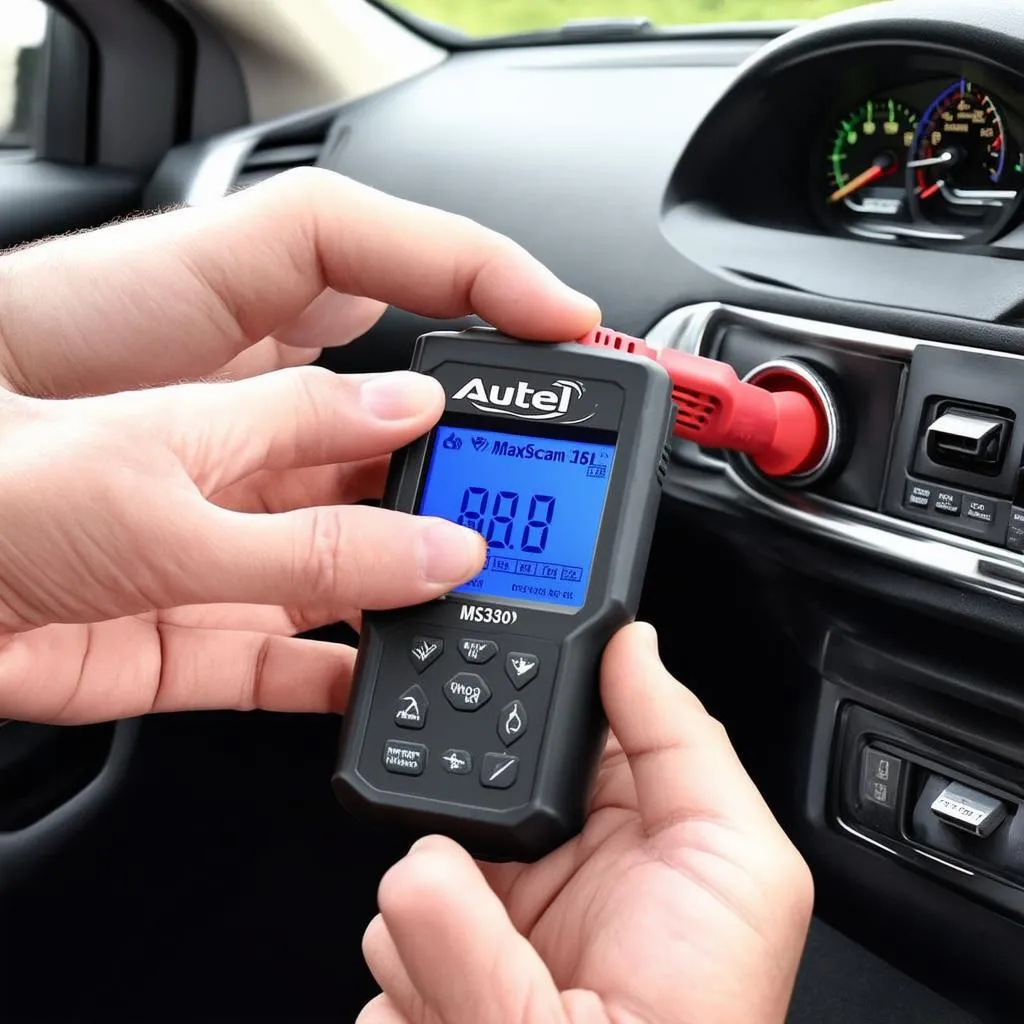 Autel MaxiScan MS309 connected to a car's OBD2 port