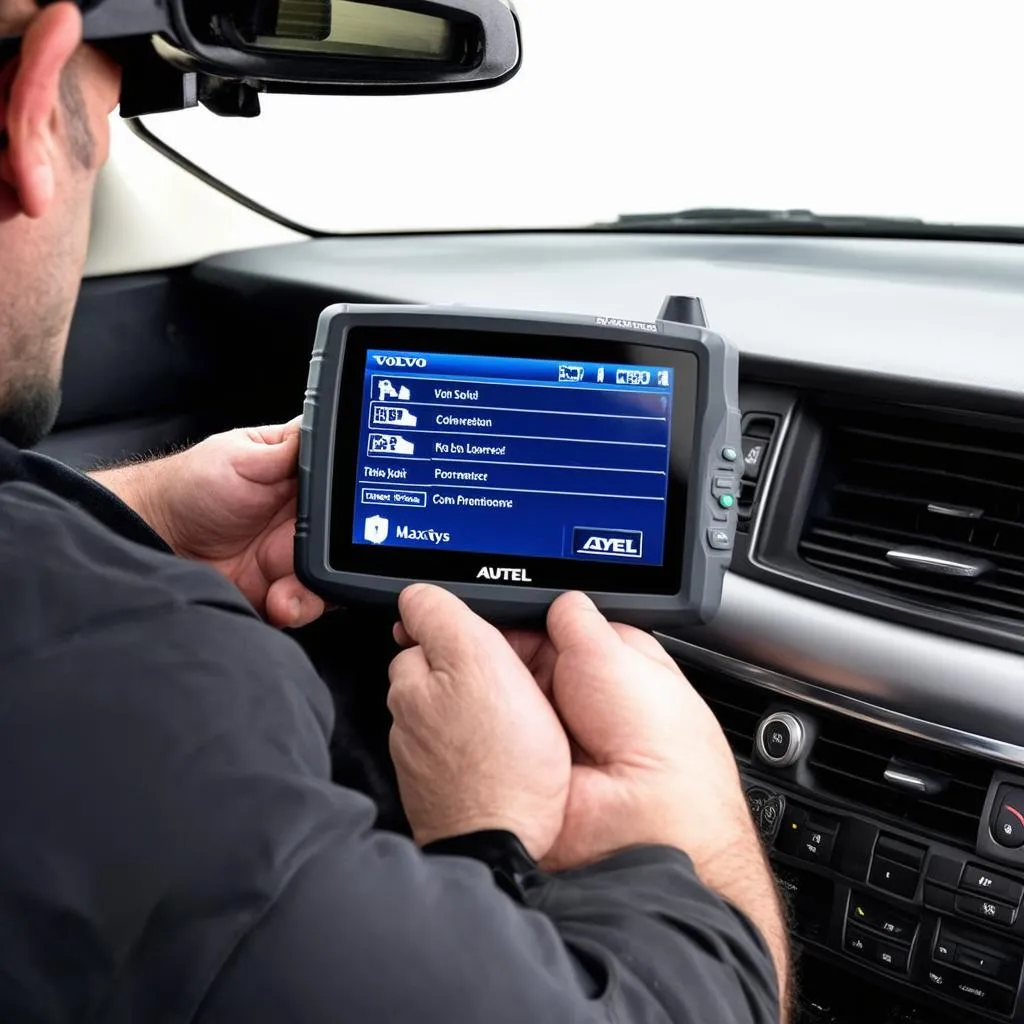 Autel MaxiSys Scanner connected to a Volvo car for key programming