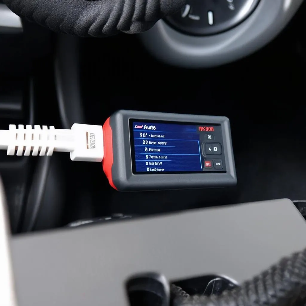 Autel MK808 diagnostic scanner connected to a car's OBD-II port