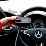 Autel Scanner Connected to Mercedes W210