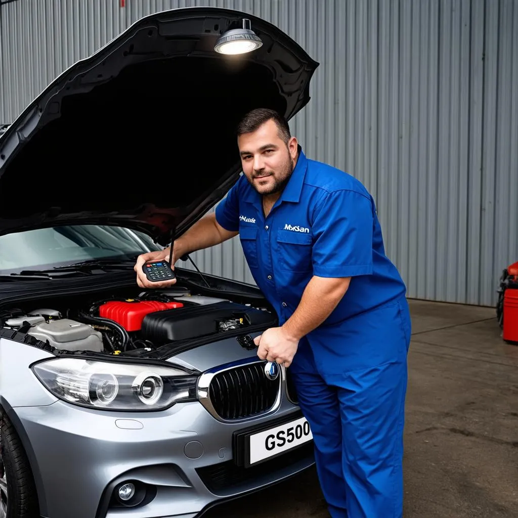 Mechanic Working on European Car Engine