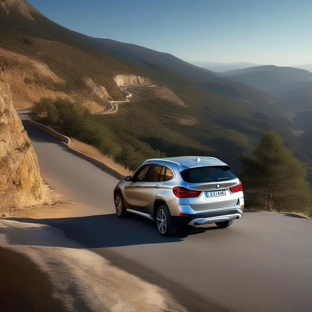 BMW X1 parked on a scenic mountain road