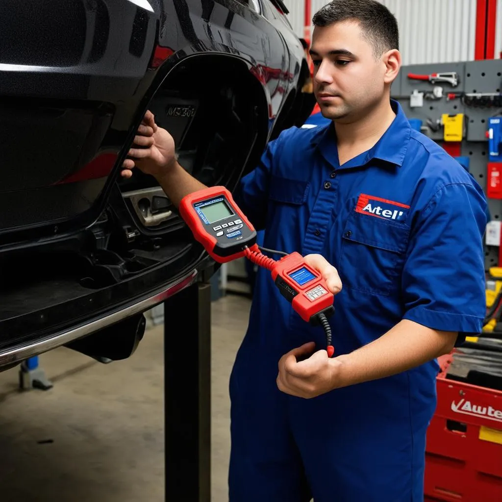 Mechanic using an Autel MaxiScan MS509 to diagnose a car in a bustling mechanic shop.