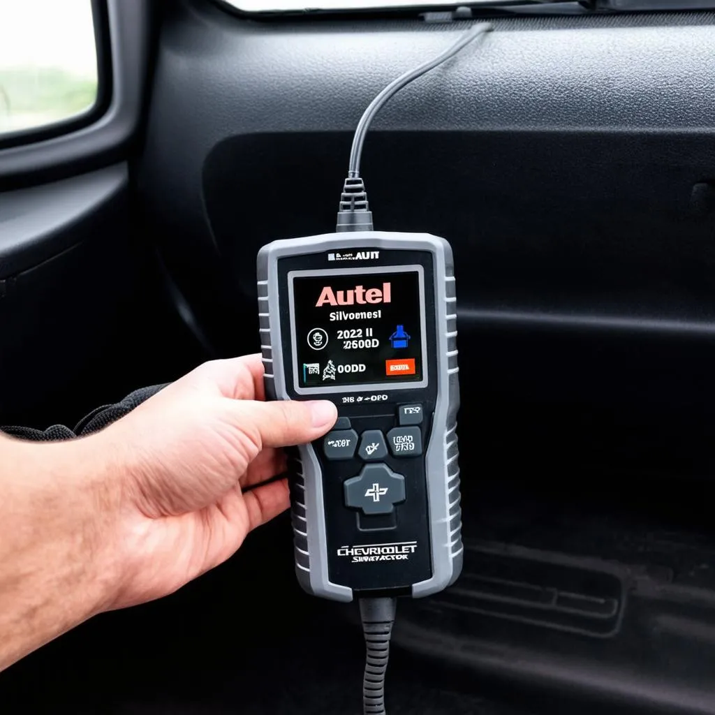 Autel Scanner Connected to a Chevy Truck's OBD-II Port