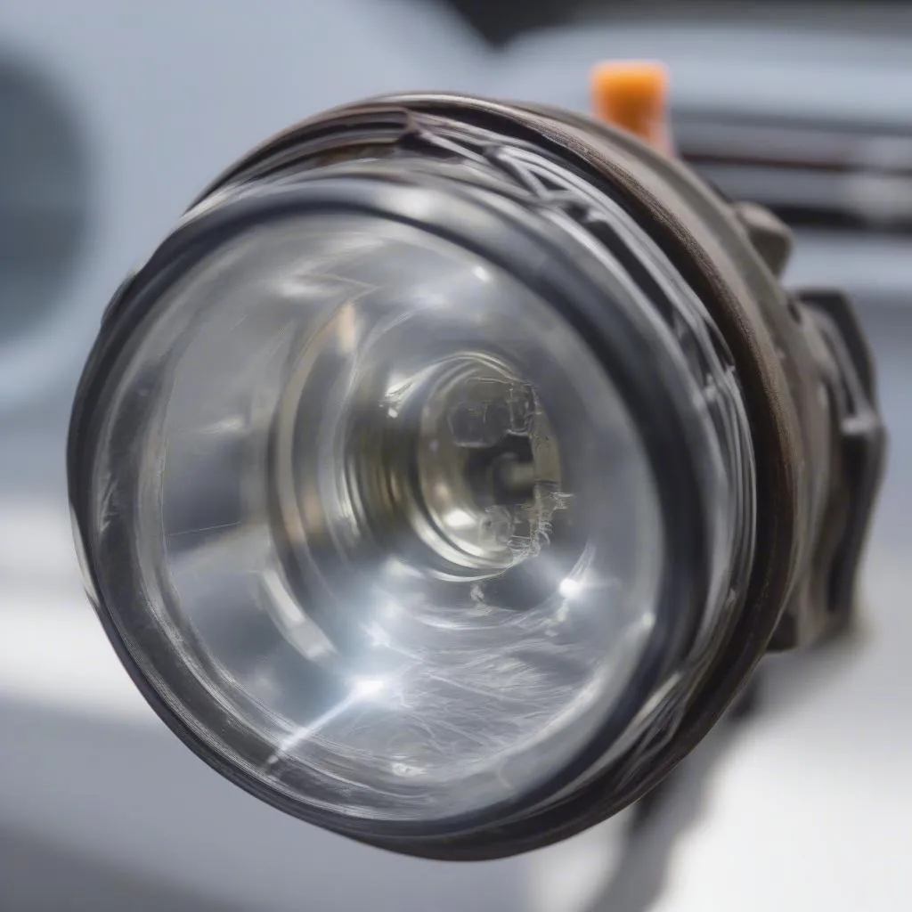 Broken Headlight Bulb