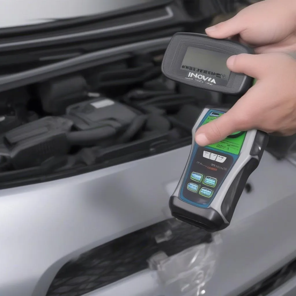 Innova 31603 Carscan ABS SRS Scan Tool connected to a European vehicle