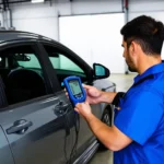 Mechanic using an OBD2 scanner to diagnose ABS light