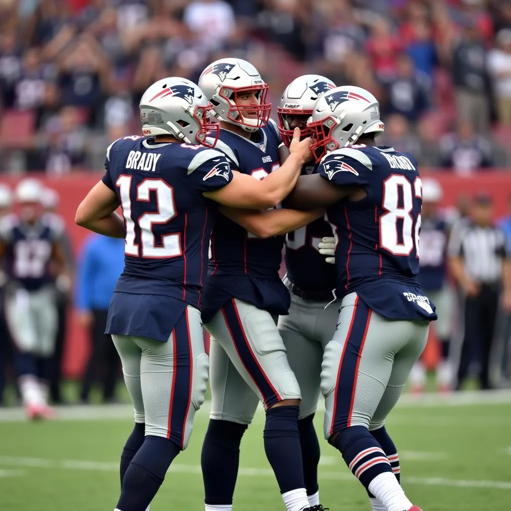 Tom Brady celebrating a touchdown with his teammates