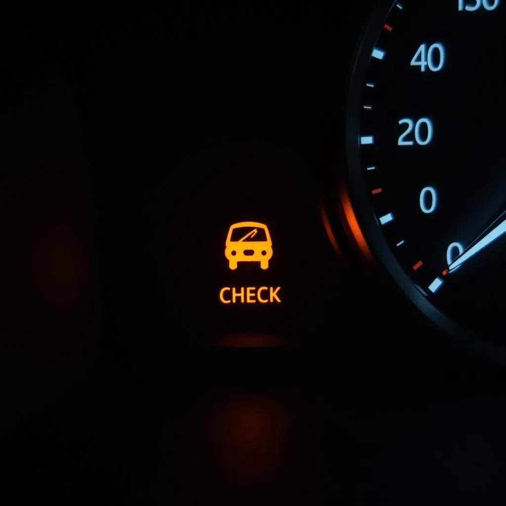 Car Dashboard with Illuminated Check Engine Light