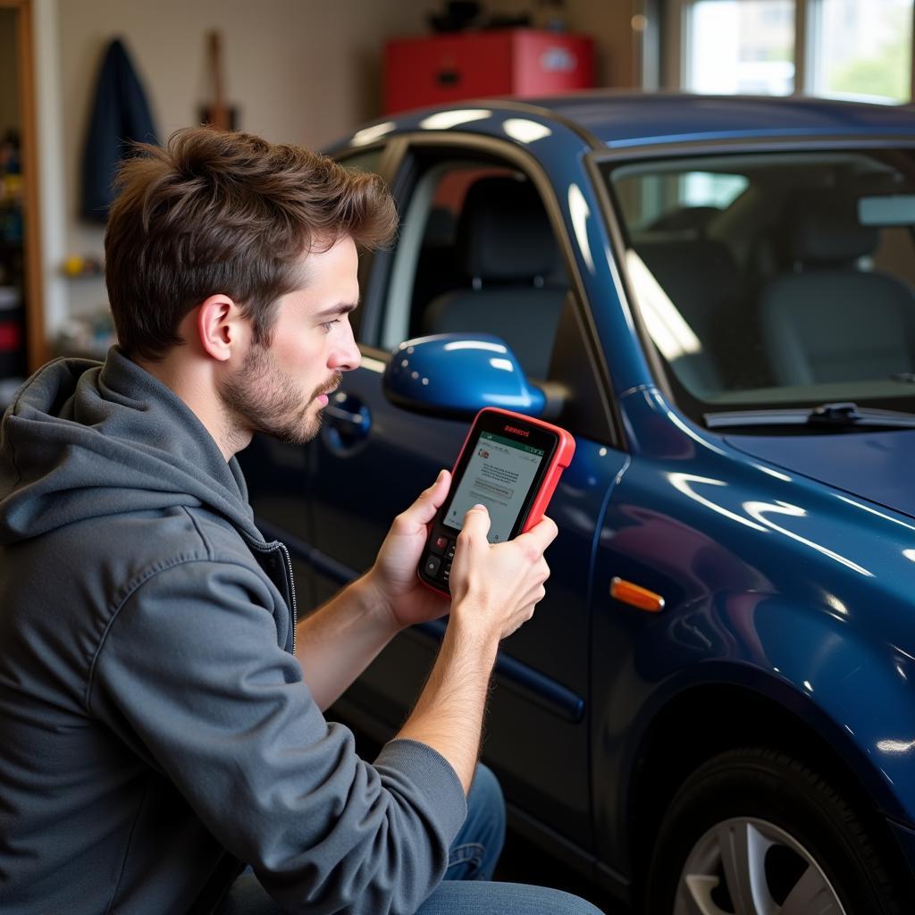 A car enthusiast diagnoses his car with an OTC scan tool in his garage