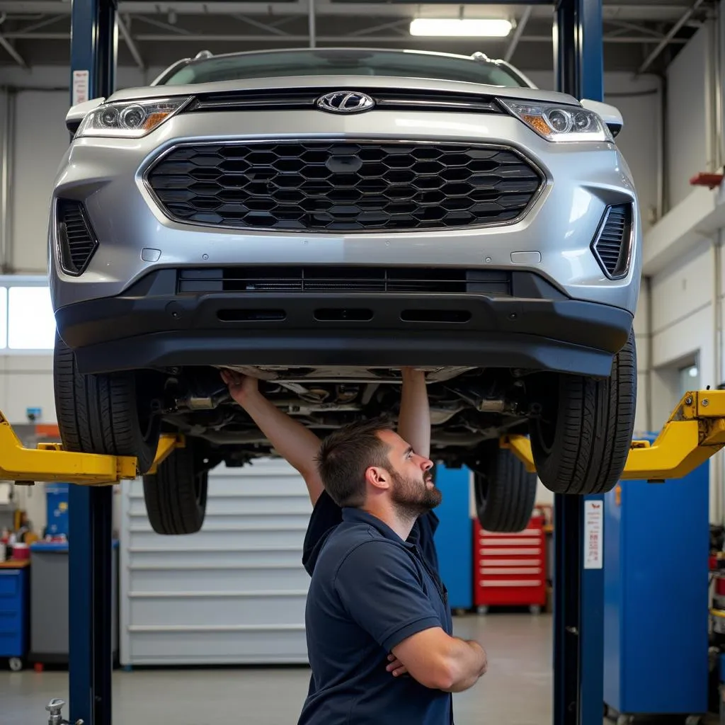 Car undergoing inspection in a repair shop