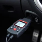 Foxwell OBD Scan Tool Connected to Car