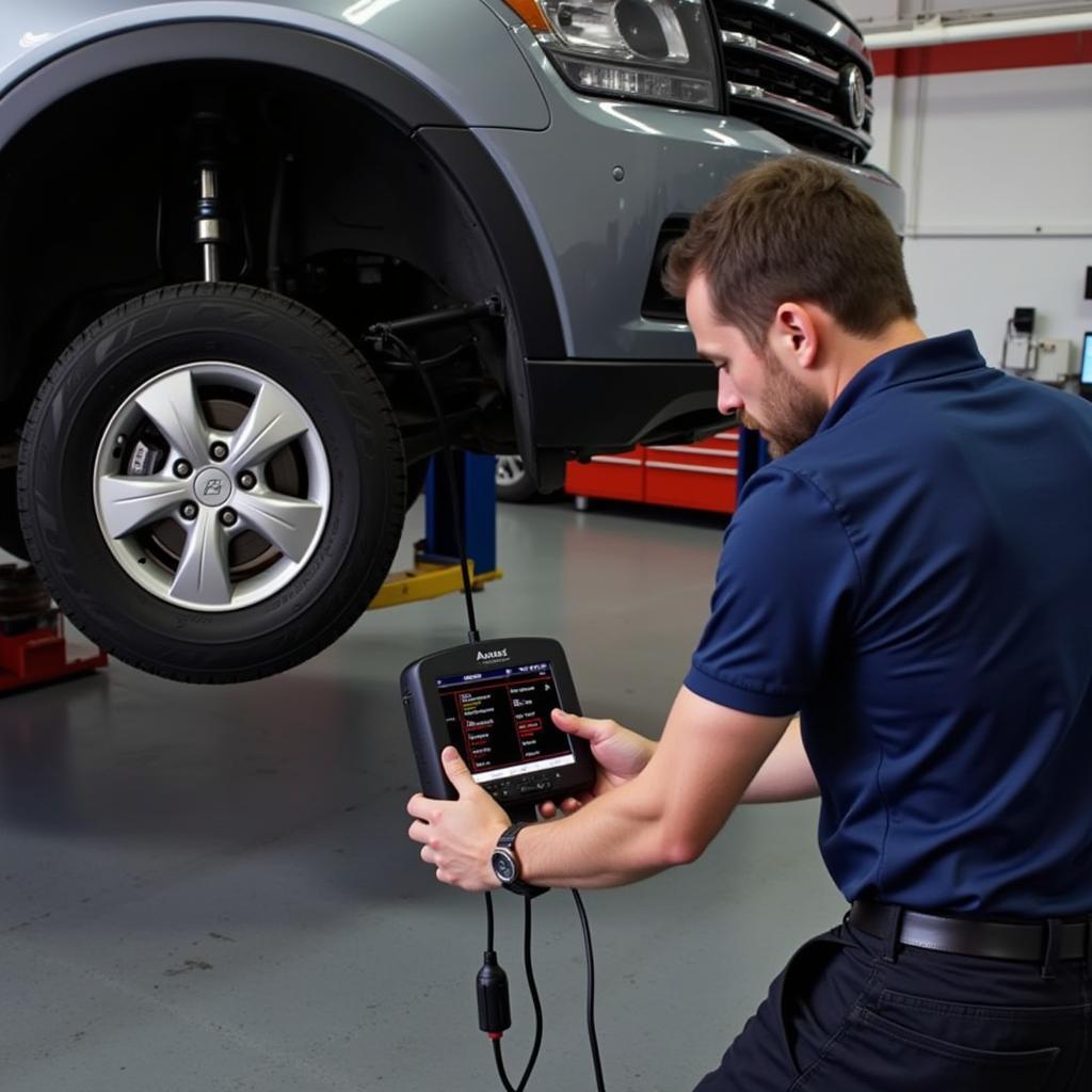 Mechanic using Autel EPB tool on a lifted car to diagnose and service the electronic parking brake system.