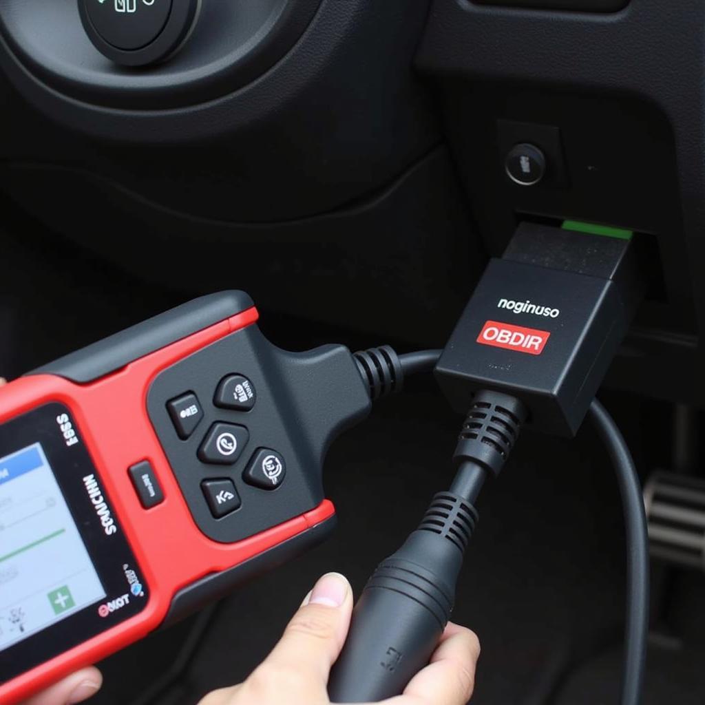 Scan tool connected to vehicle's OBD-II port for ABS diagnostics