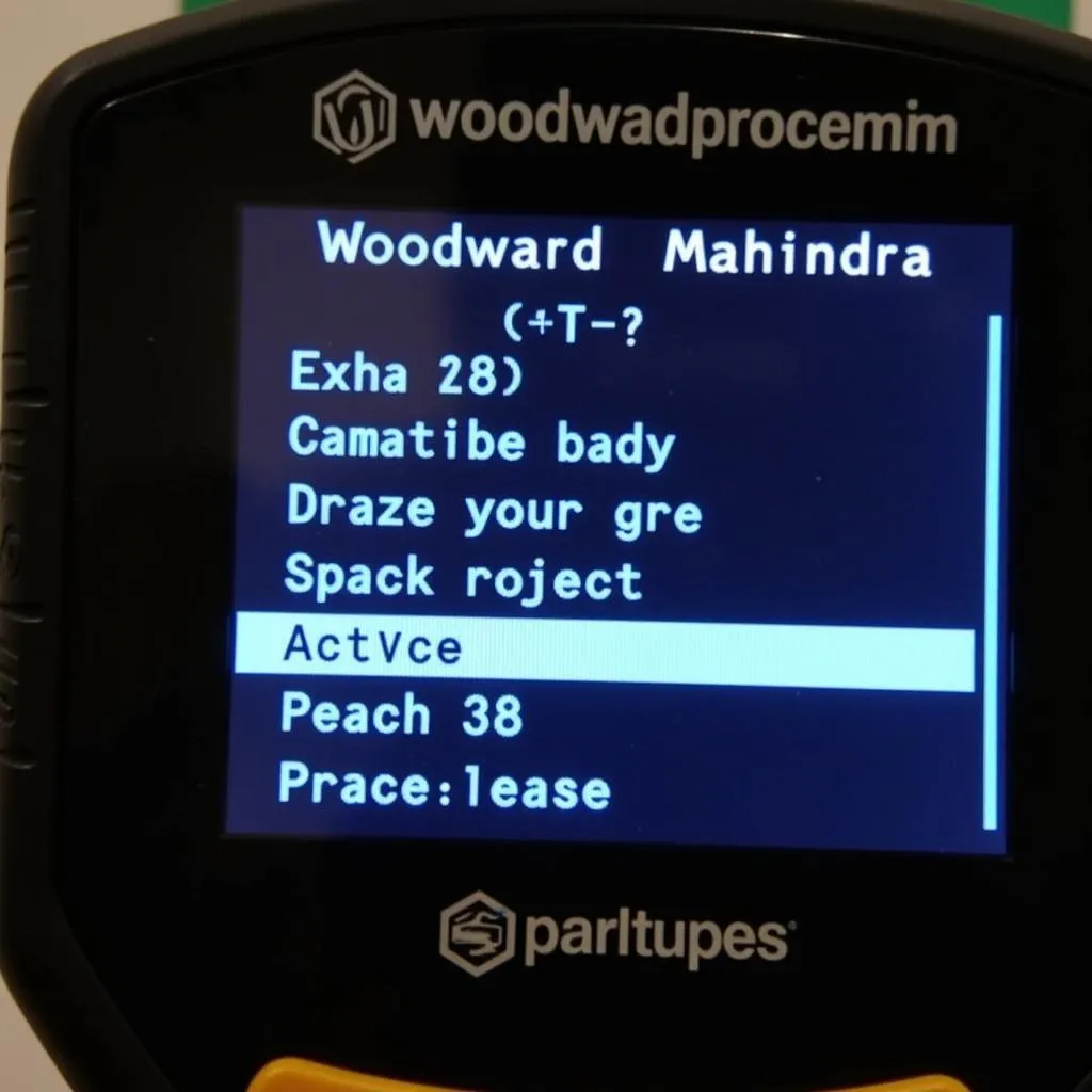 A scan tool displaying a list of active Woodward Mahindra error codes on its screen.