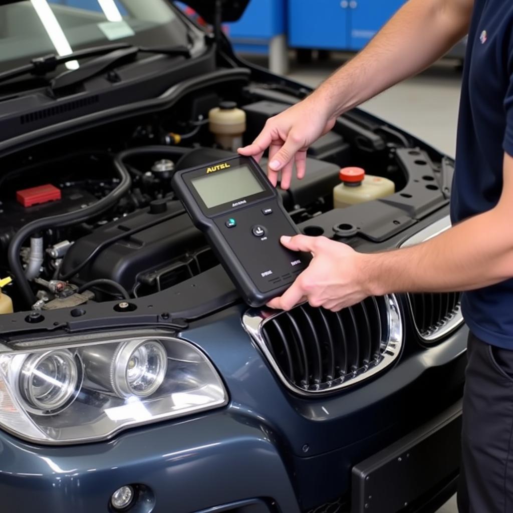 Mechanic Using the Autel AL319 for Vehicle Diagnostics