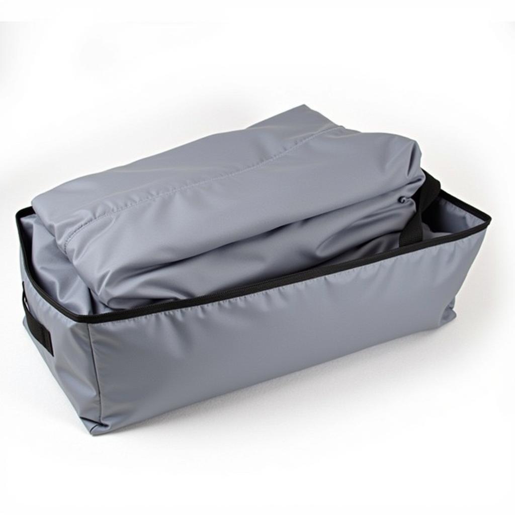 Folded Car Cover in a Storage Bag