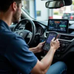 Mechanic Using a Dealer Scanner on a Rental Car