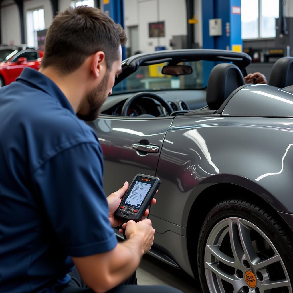 Mechanic diagnosing a 2-seater car with a scanner